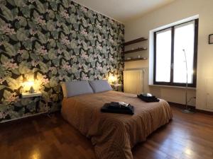 Posteľ alebo postele v izbe v ubytovaní Centro storico-Dimora con terrazza- Wi-Fi e Ac