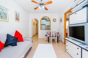 TV a/nebo společenská místnost v ubytování Apartamento Playa Capitan