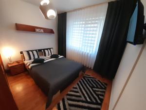 Krevet ili kreveti u jedinici u objektu Apartament Andreea
