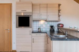 Een keuken of kitchenette bij Rosengarten