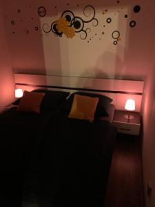 Postel nebo postele na pokoji v ubytování Apartmány City 2