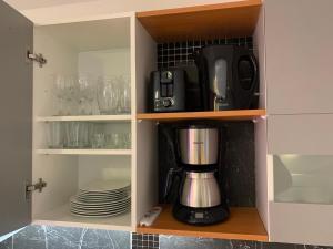 Kuchyň nebo kuchyňský kout v ubytování Apartmány City 2