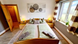 Posteľ alebo postele v izbe v ubytovaní A&Z Apartment Siegl