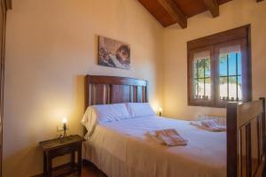 Postel nebo postele na pokoji v ubytování Villa Bou - PlusHolidays + 20 fotografií