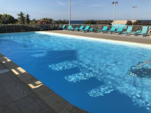 Fotografia z galérie ubytovania Appartement convivial à Cervione, 35 m², piscine partagée v destinácii Cervione