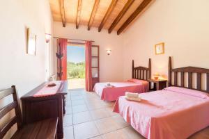 Posteľ alebo postele v izbe v ubytovaní Sa Pobla - 40796 Mallorca5