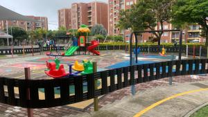 a playground in a park with a play area at Apartamento amoblado nuevo in Pereira
