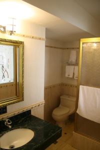Koupelna v ubytování Hotel Oro Inn