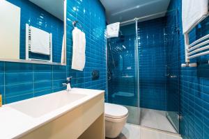 Baðherbergi á Makmani Boutique Hotel by DNT Group