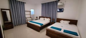 Postel nebo postele na pokoji v ubytování Vidushi Home + 37 fotografií
