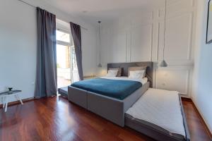 Кровать или кровати в номере Luxury Seaview Apartment