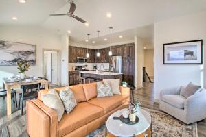 a living room with a couch and a kitchen at Eden Home with Stunning View about 6 Mi to Skiing! in Eden