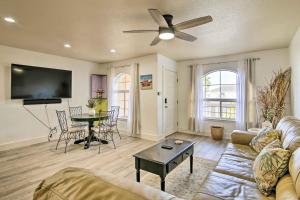 a living room with a couch and a table at South Padre Island Getaway - Newly Renovated! in South Padre Island