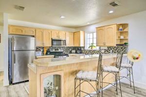 a kitchen with a fireplace in the middle of it at South Padre Island Getaway - Newly Renovated! in South Padre Island