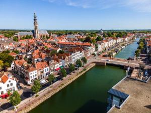 an aerial view of a city with a river at Number 9 holiday apartments in Middelburg +17 photos
