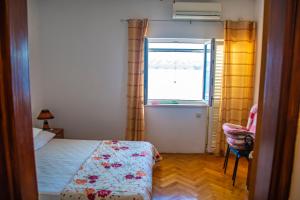 Postel nebo postele na pokoji v ubytování Apartments Lile by the sea, Čelina Zavode