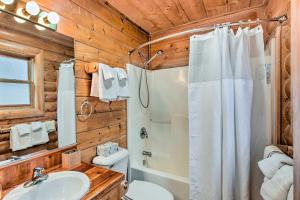 a bathroom with a shower toilet and a sink at Mtn Retreat in Angel Fire - Ride 4 Blocks to Lift! in Angel Fire +19 photos