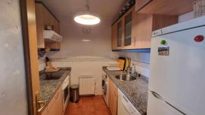 Kuchyň nebo kuchyňský kout v ubytování Apartamento vacacional Marita + 12 fotografií