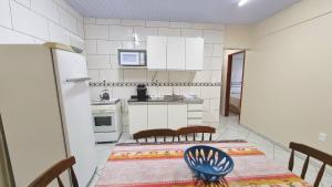 Cuisine ou kitchenette dans l'établissement Residencial Las Rocas I