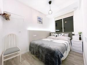 Posteľ alebo postele v izbe v ubytovaní Sol Apartamentos Centro Histórico