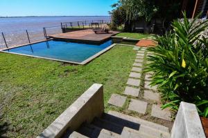 Bazén v ubytování Sudeste Asiático con Pileta sobre el Rio Paraná nebo v jeho okolí