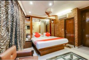 Postel nebo postele na pokoji v ubytování Hotel Roma Deluxe - New Delhi Railway Station