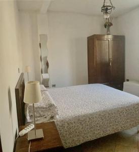 Postel nebo postele na pokoji v ubytování Delizioso appartamento in villa tra mare e città