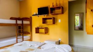 Postel nebo postele na pokoji v ubytování Villa Residencial Encantos Da Mata