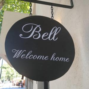 a sign that says bell welcome home on a building at Bell 5 in Buenos Aires
