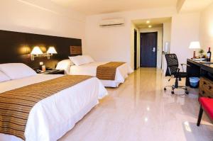 Letto o letti in una camera di Hotel Balandra