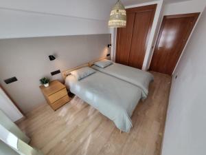 A bed or beds in a room at Sierra Nevada Gala Bike CAR