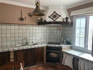 Kuchyň nebo kuchyňský kout v ubytování CASA ISA, ideal para descansar. + 26 fotografií