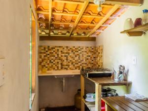 Kuchyň nebo kuchyňský kout v ubytování Villa Residencial Encantos Da Mata