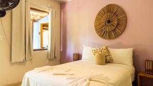 Postel nebo postele na pokoji v ubytování Villa Residencial Encantos Da Mata