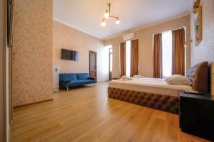 Postel nebo postele na pokoji v ubytování Hotel Guri