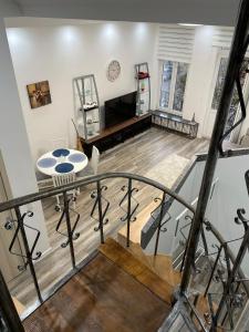 a view of a living room from the top floor of a house at Duplex situé a 2min de la gare du nord in Brussels