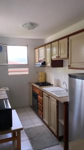Nhà bếp/bếp nhỏ tại f3 location saisonnière détente tranquillité et belle vue