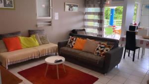 Khu vực ghế ngồi tại f3 location saisonnière détente tranquillité et belle vue