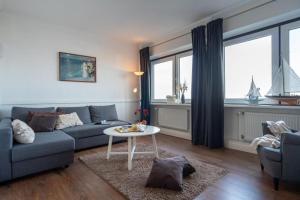 Posezení v ubytování Strandhotel-Heiligenhafen-Wohnung-120-Wellenreiter-Typ-II