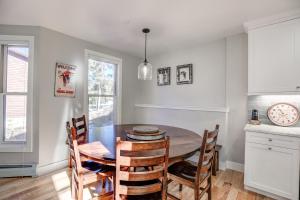 a dining room with a table and chairs at Just Walk Inn Townhome: Stroll To Main St, Gondola in Breckenridge
