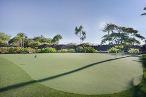 a view of a golf course with a green at Hali'i Kai 3B in Waikoloa