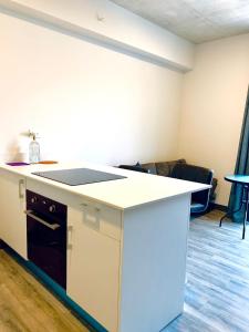 Kjøkken eller kjøkkenkrok på Único Apartamento en Nuevo y Moderno Condominio
