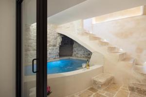 Fotografie z fotogalerie ubytování Suite Le Grotte v destinaci Ostuni + 22 fotografií