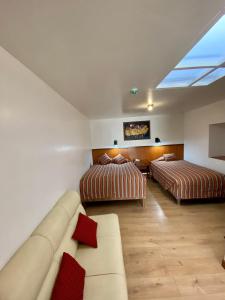 Rúm í herbergi á Saphi Inn Cusco - Excelente ubicación