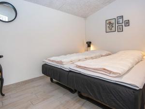 Postel nebo postele na pokoji v ubytování Luxury Spa Retreat in Arrild - By Traum Ferienwohnungen