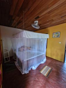 Postel nebo postele na pokoji v ubytování Nimal`s Homestay