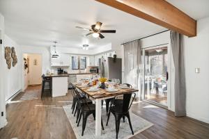 a dining room and kitchen with a table and chairs at Welcome to The Mountain Escape! in Albrightsville