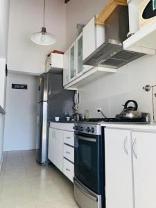 Kitchen o kitchenette sa LOS SAUCES CHASCOMUS