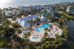 an aerial view of the pool at the resort at 933 Cinnamon Beach, 3 Bedroom, Sleeps 8, 2 Pools, Elevator, WiFi in Palm Coast