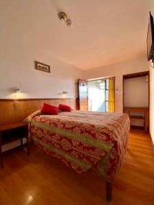 Rúm í herbergi á Saphi Inn Cusco - Excelente ubicación